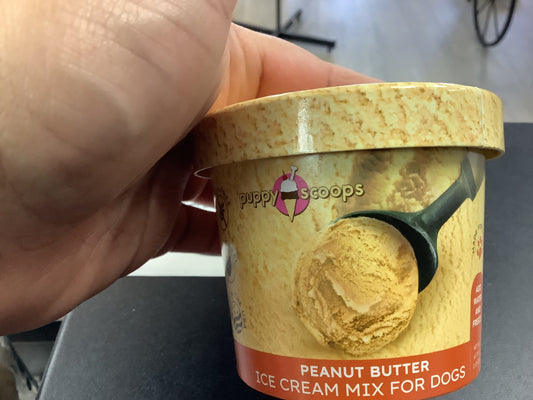 Puppy scoops PB
